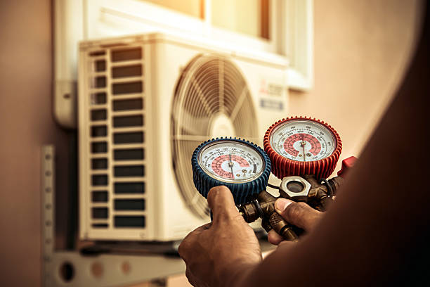 Professional Air Conditioning Service technician working in Pleasant Valley, WV